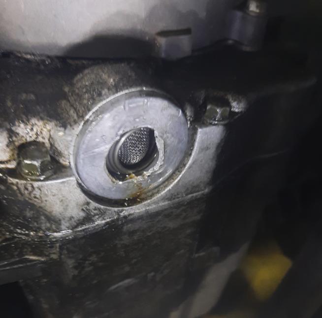 How can I get this broken oil drain cover off? Motor Vehicle