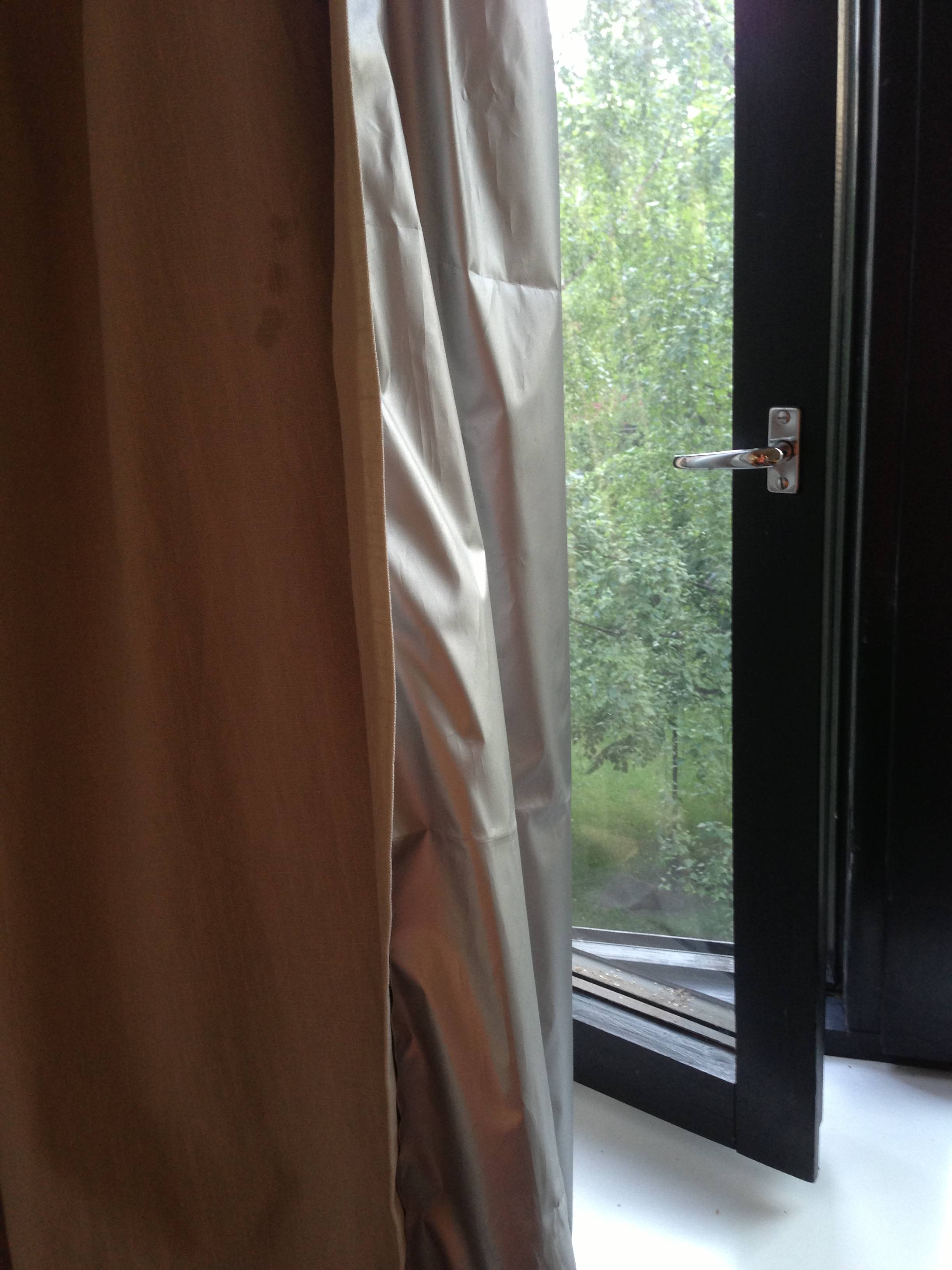 windows What is the name of these silver curtains used to reflect