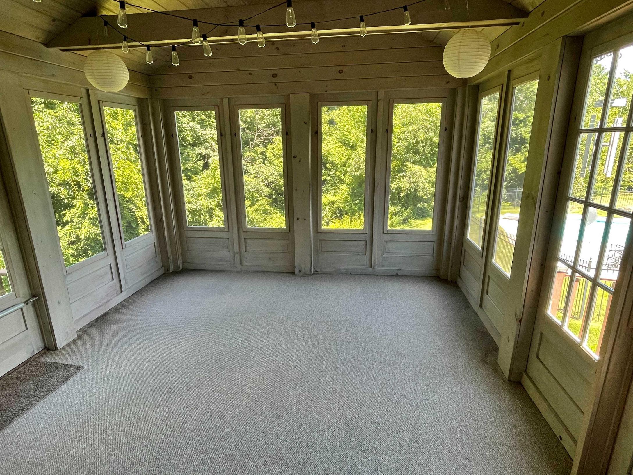 floor Is a plywood subfloor with outdoor carpeting glued on