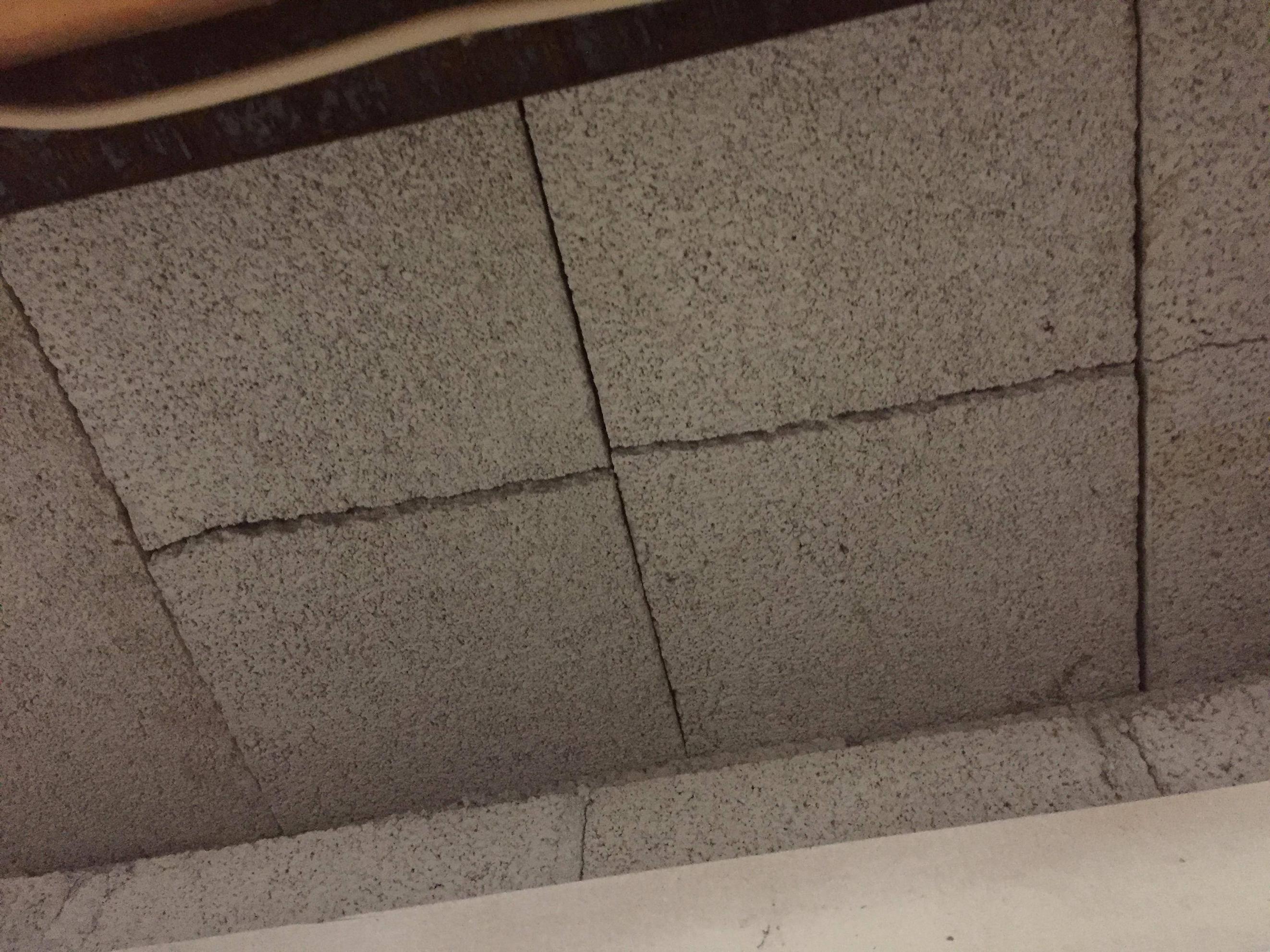 Cracked bricks/stones in the ceiling near fireplace Love & Improve Life
