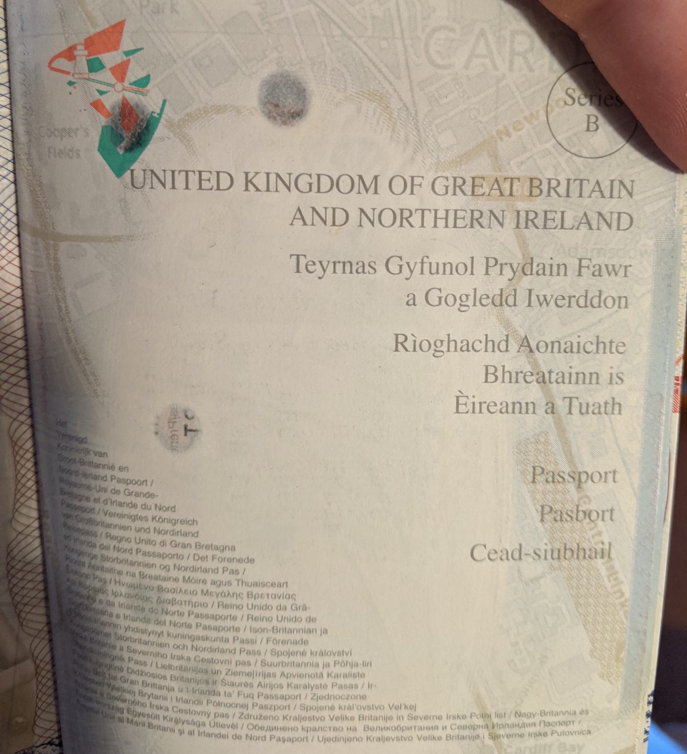 india Small oil stains on the biodata page of my UK passport. Is