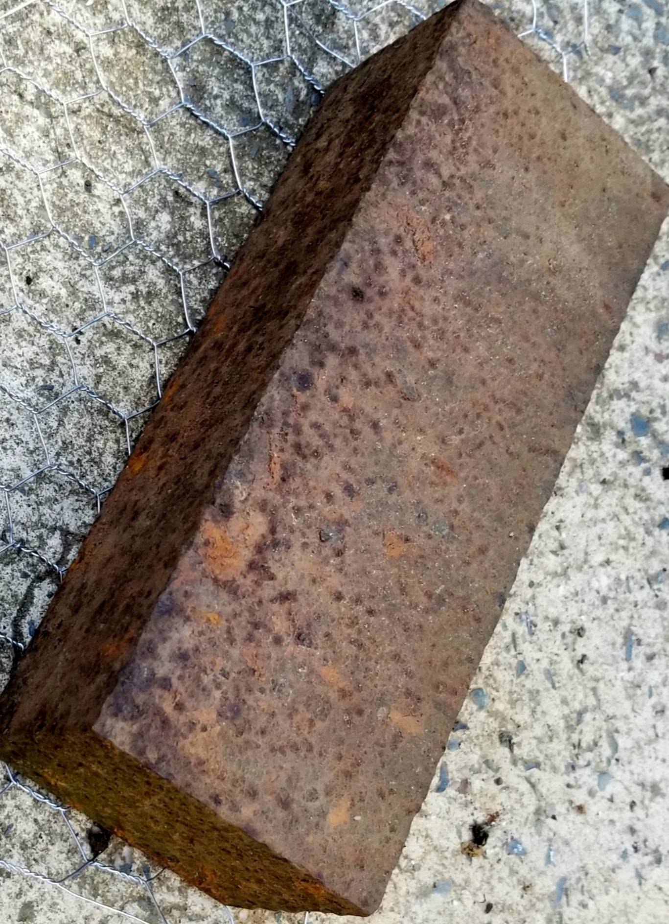 brick What is this metal block found in our yard? Home Improvement