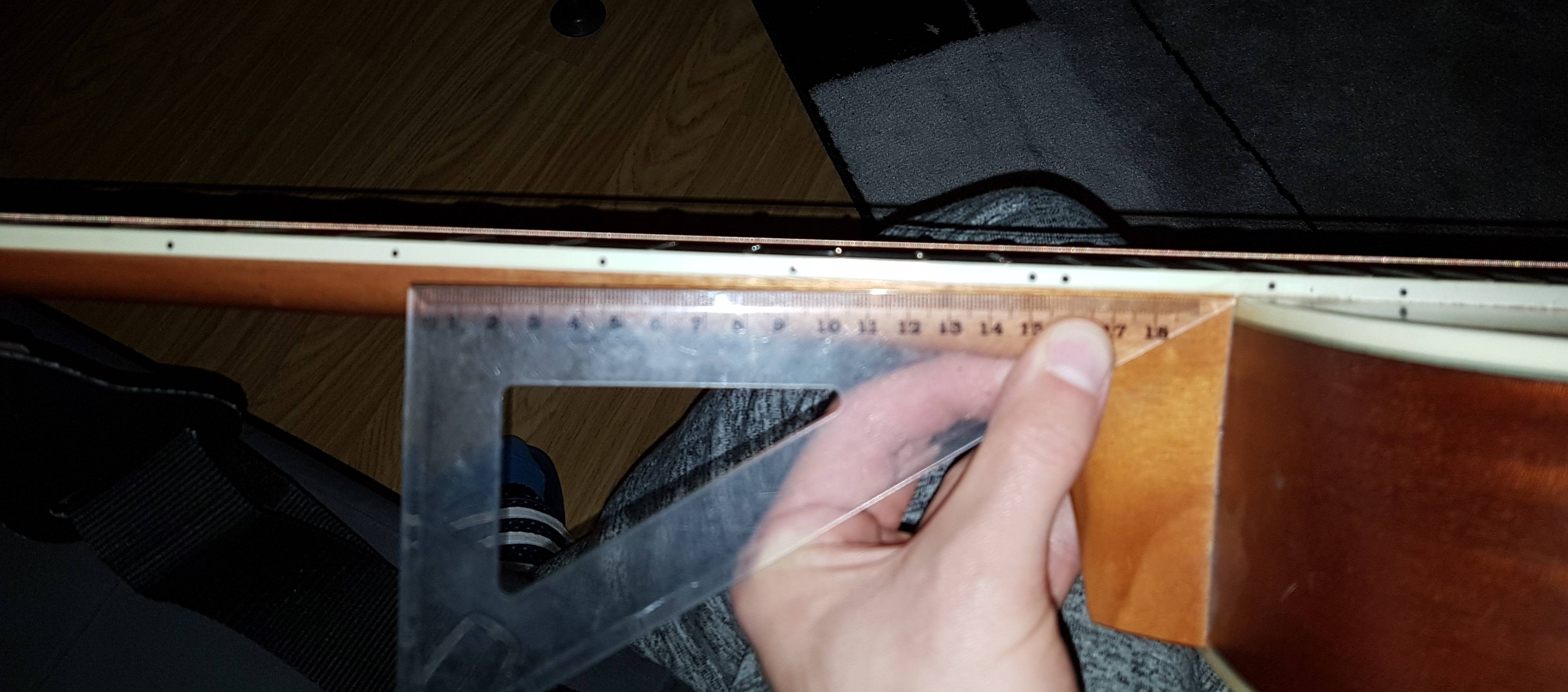 maintenance When adjusting the neck of an acoustic guitar, what