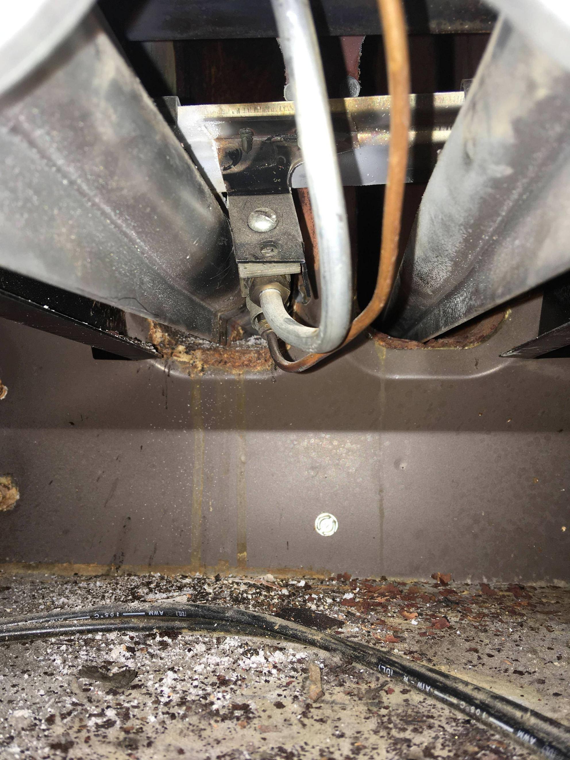 hvac Rust and ash in my AC/furnace should I be concerned? Home