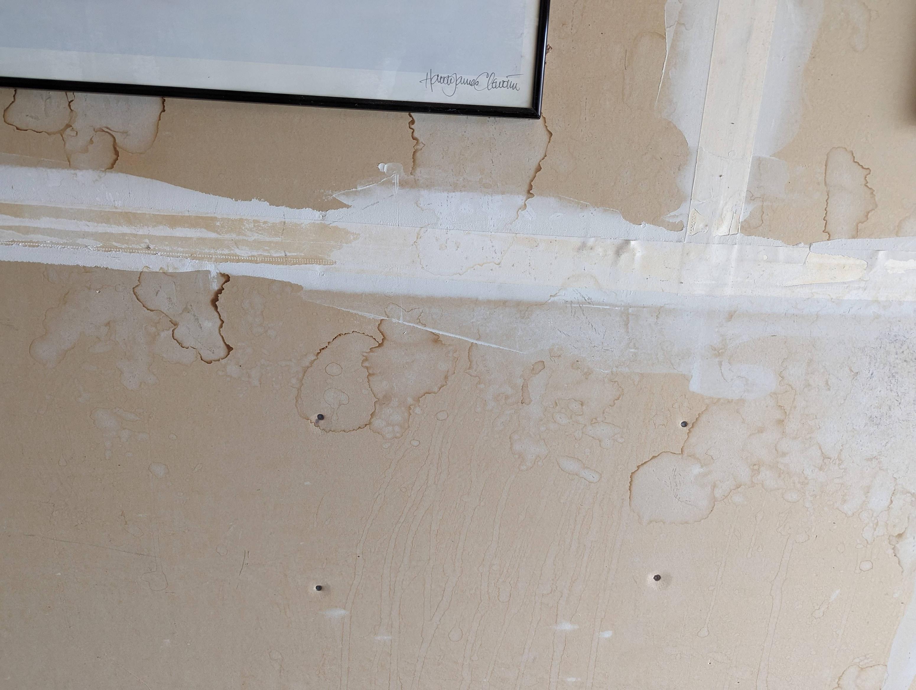 Improving water stained unpainted garage drywall Home Improvement