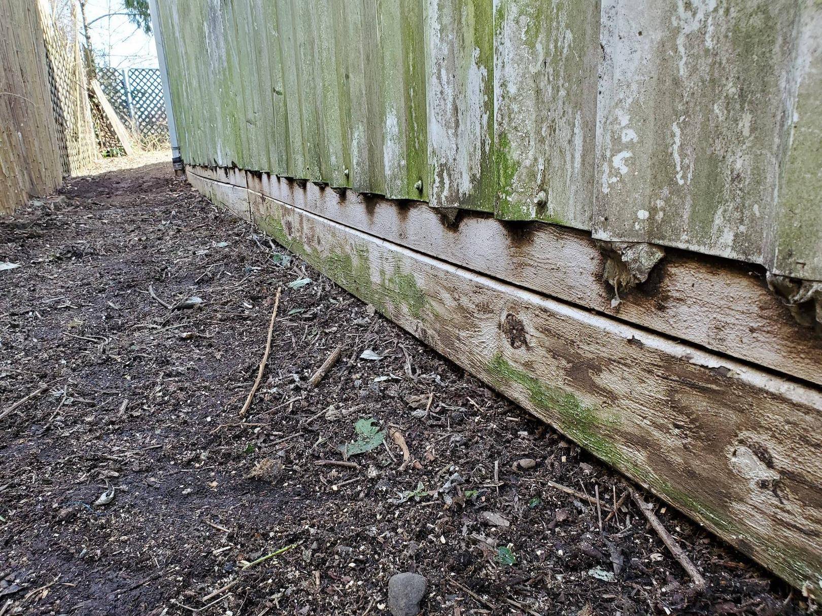 landscaping Proper way to lay gravel around garage Home Improvement