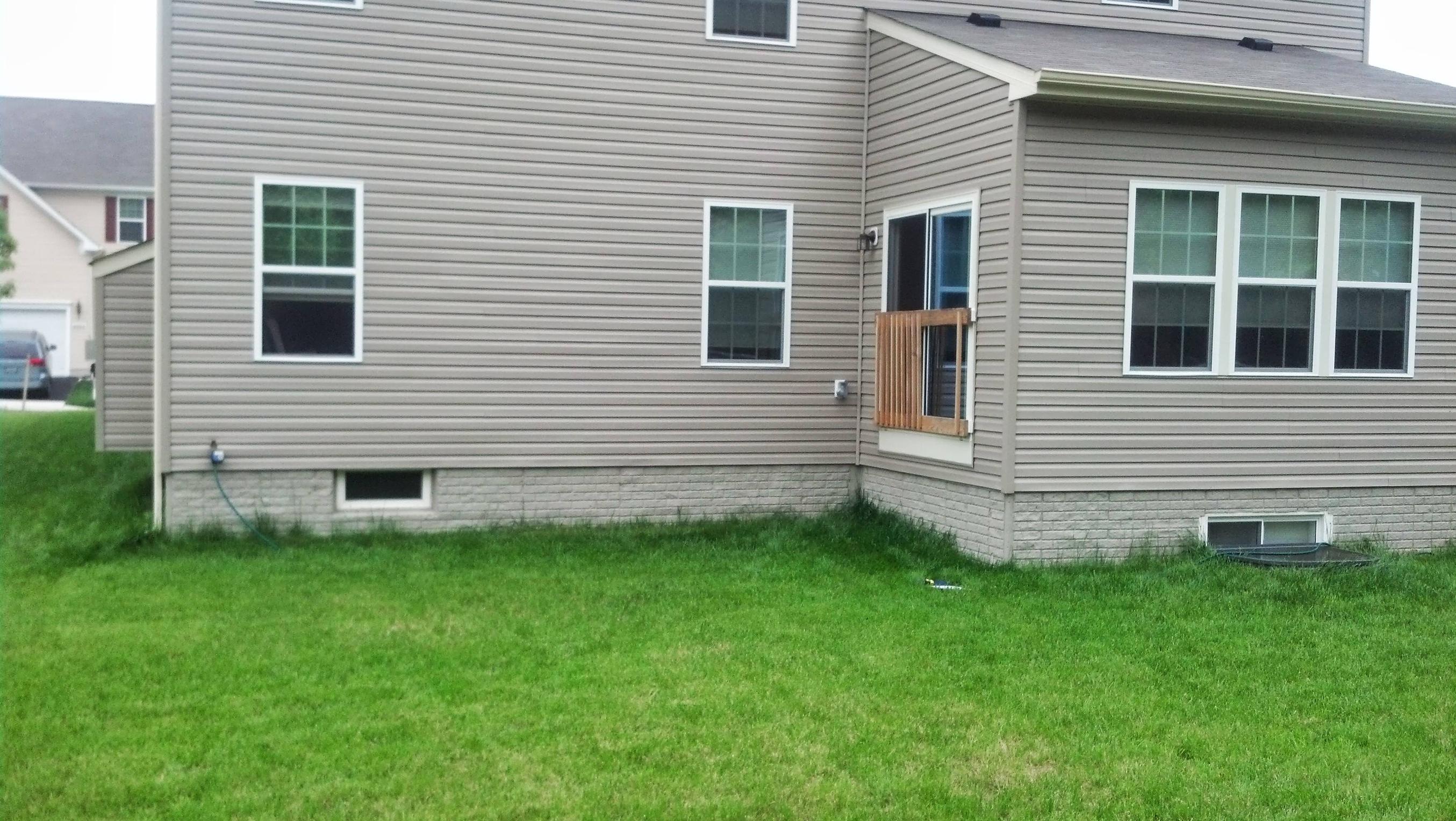 How should I attach a deck on the corner of my house? - Home