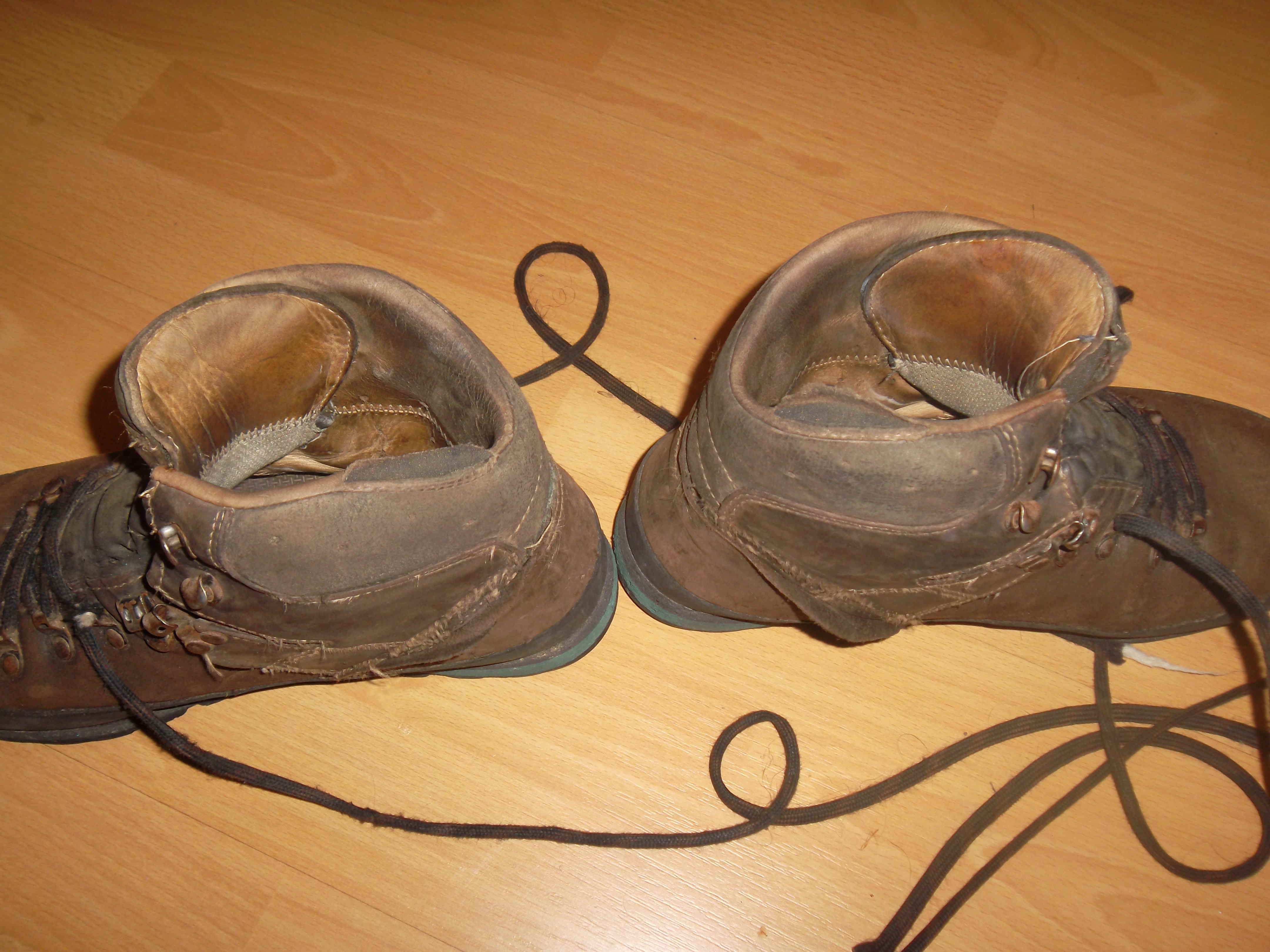 How to repair the broken stitching and seams in my leather boots? The