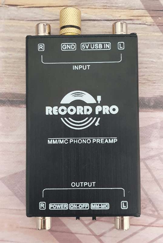 Help me figure out how to connect a ground wire to a phono preamplifier