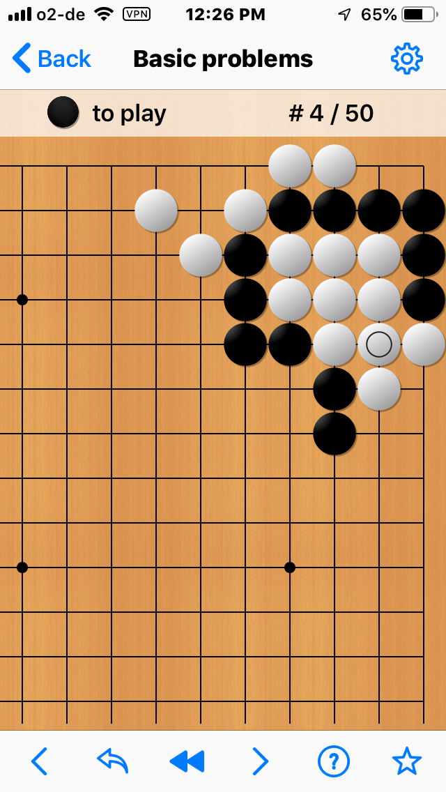 Can anyone explain the last move on this go board Board & Card Games