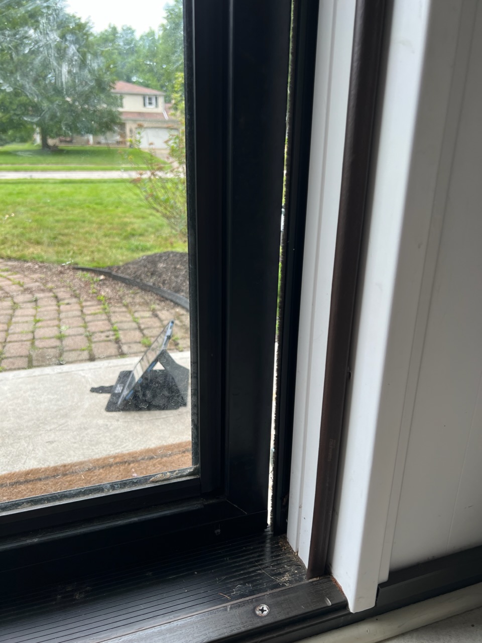 What's the best way to secure a flexing storm door jamb? Home Improvement Stack Exchange