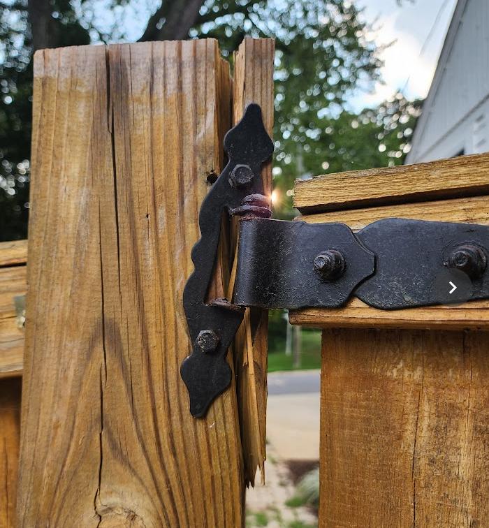 How can I repair a 6x6 fence post split at the hinge mounted near the