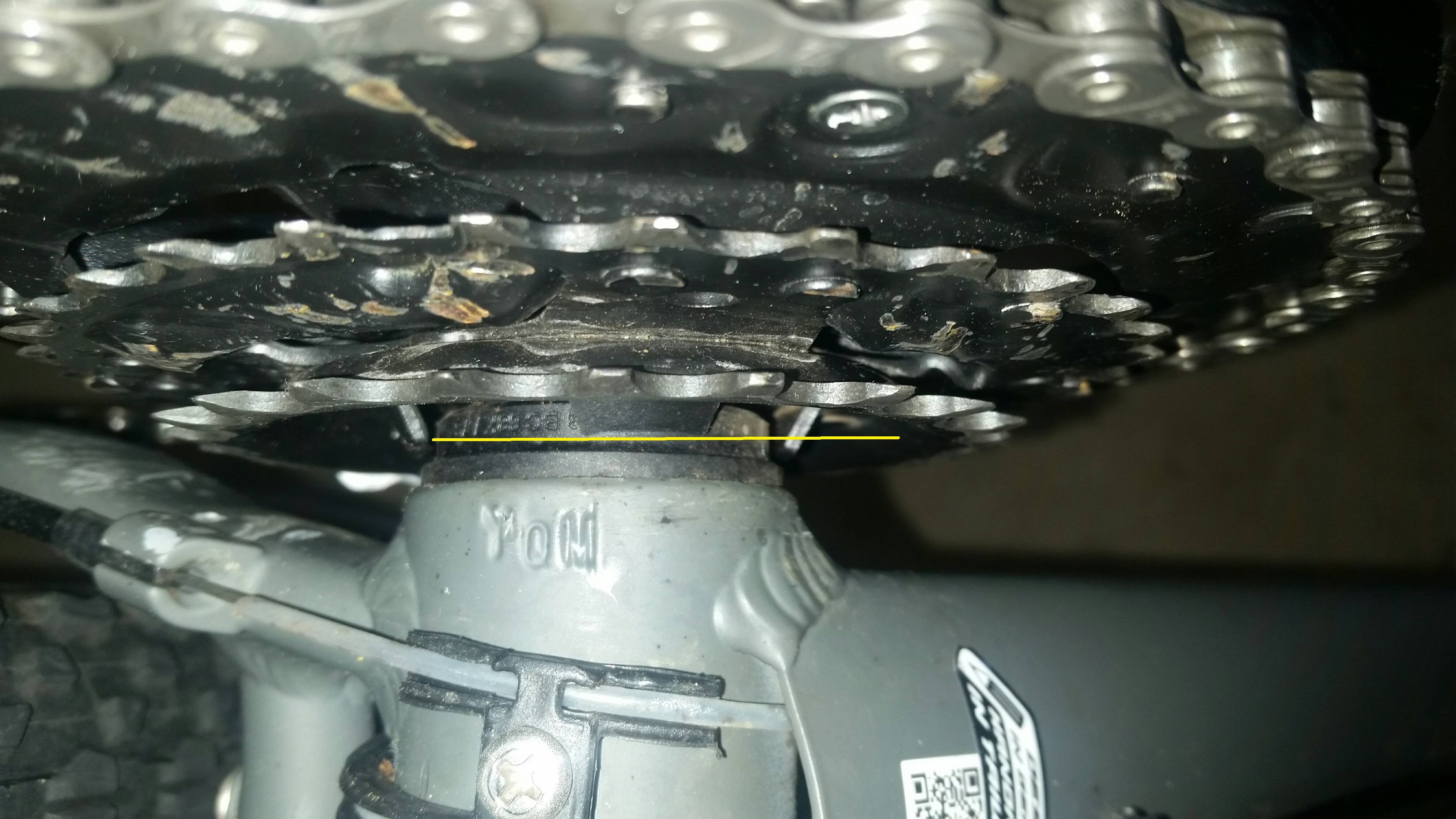 [SOLVED] Chain hitting front derailleur cage with H limit screw fully