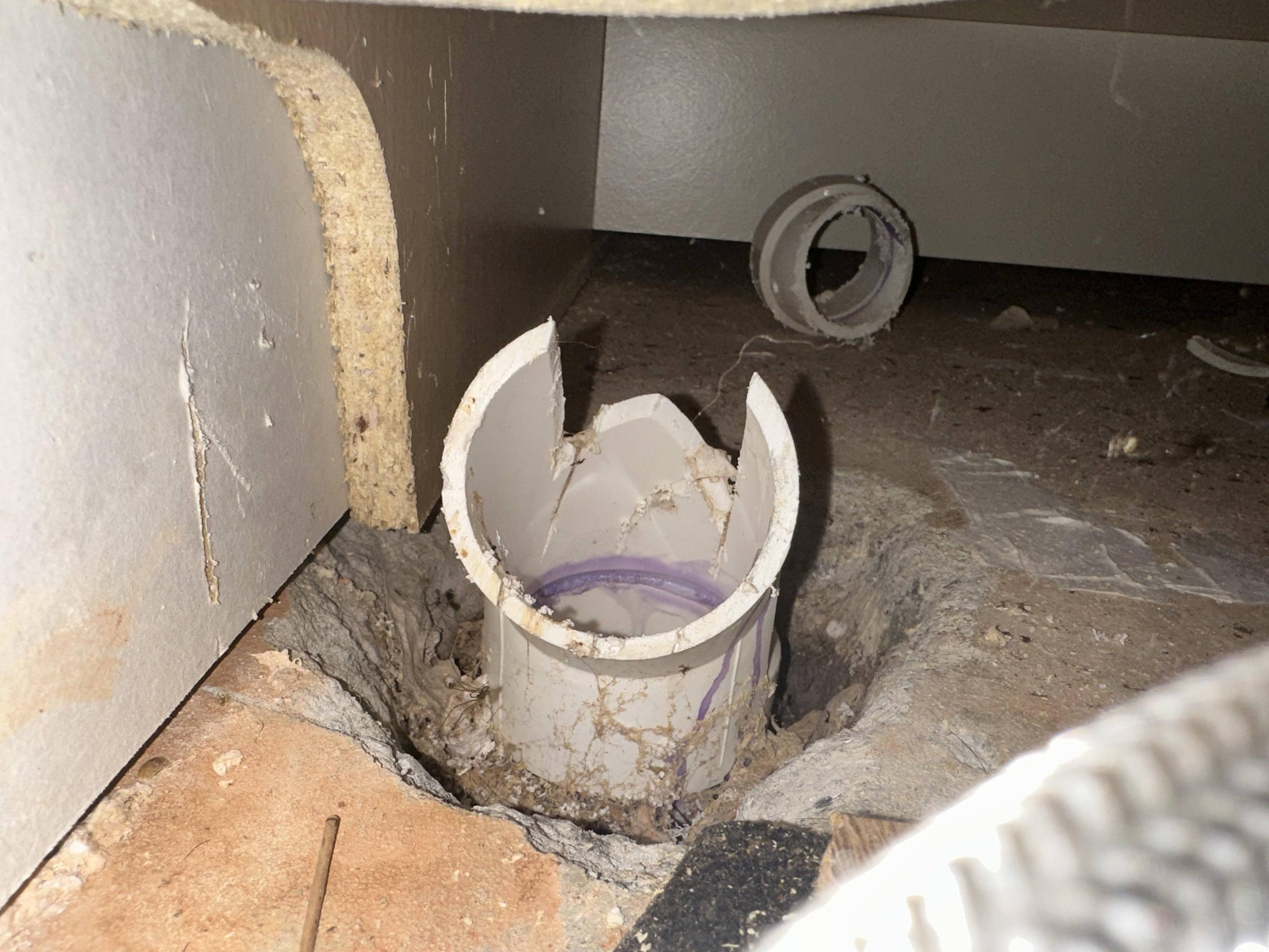 How can I prevent my ice maker from allowing water draining to back up