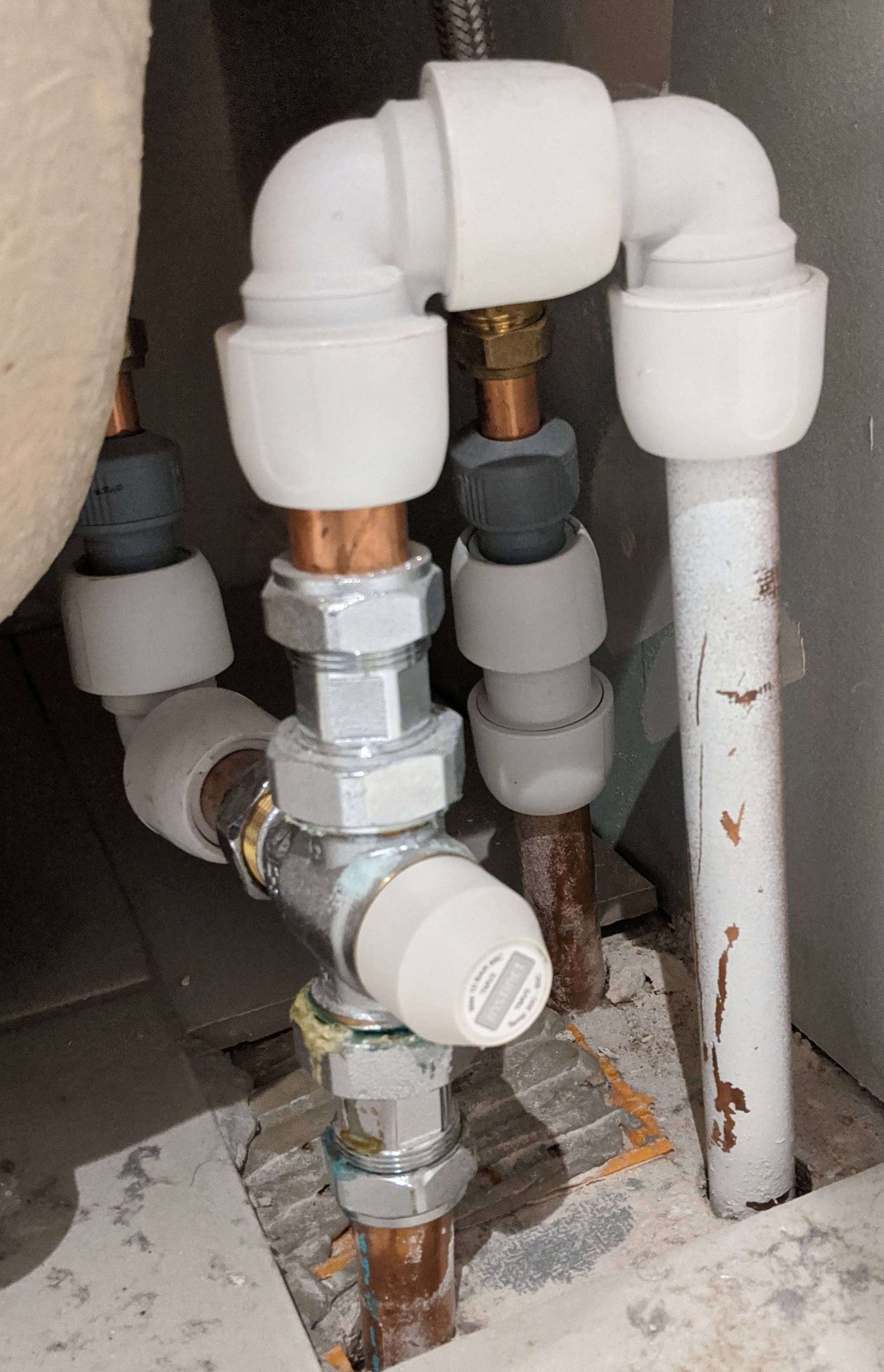 plumbing Cap off hot water from bath with two pipes Home
