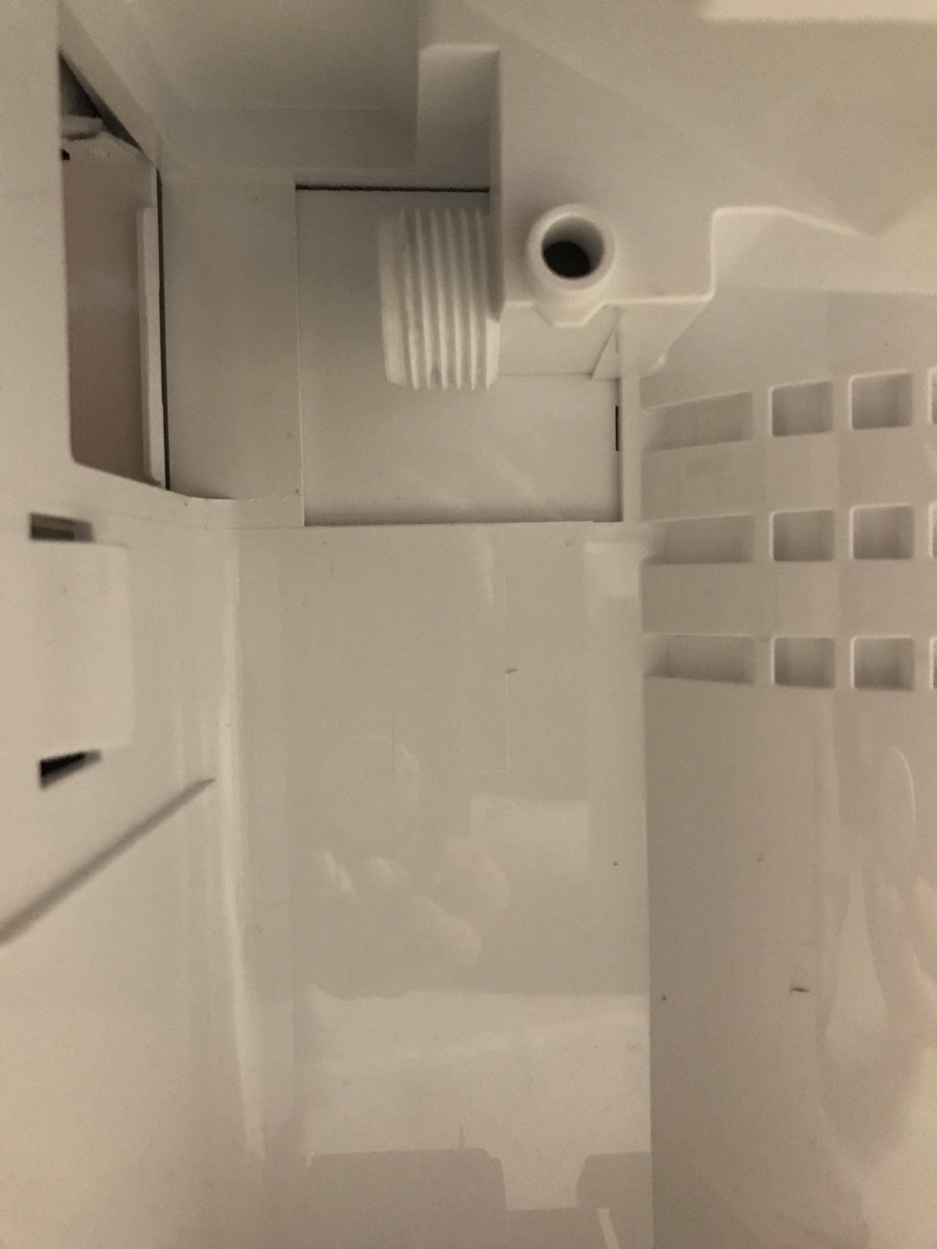 Dehumidifier is draining through a hose and through a second opening