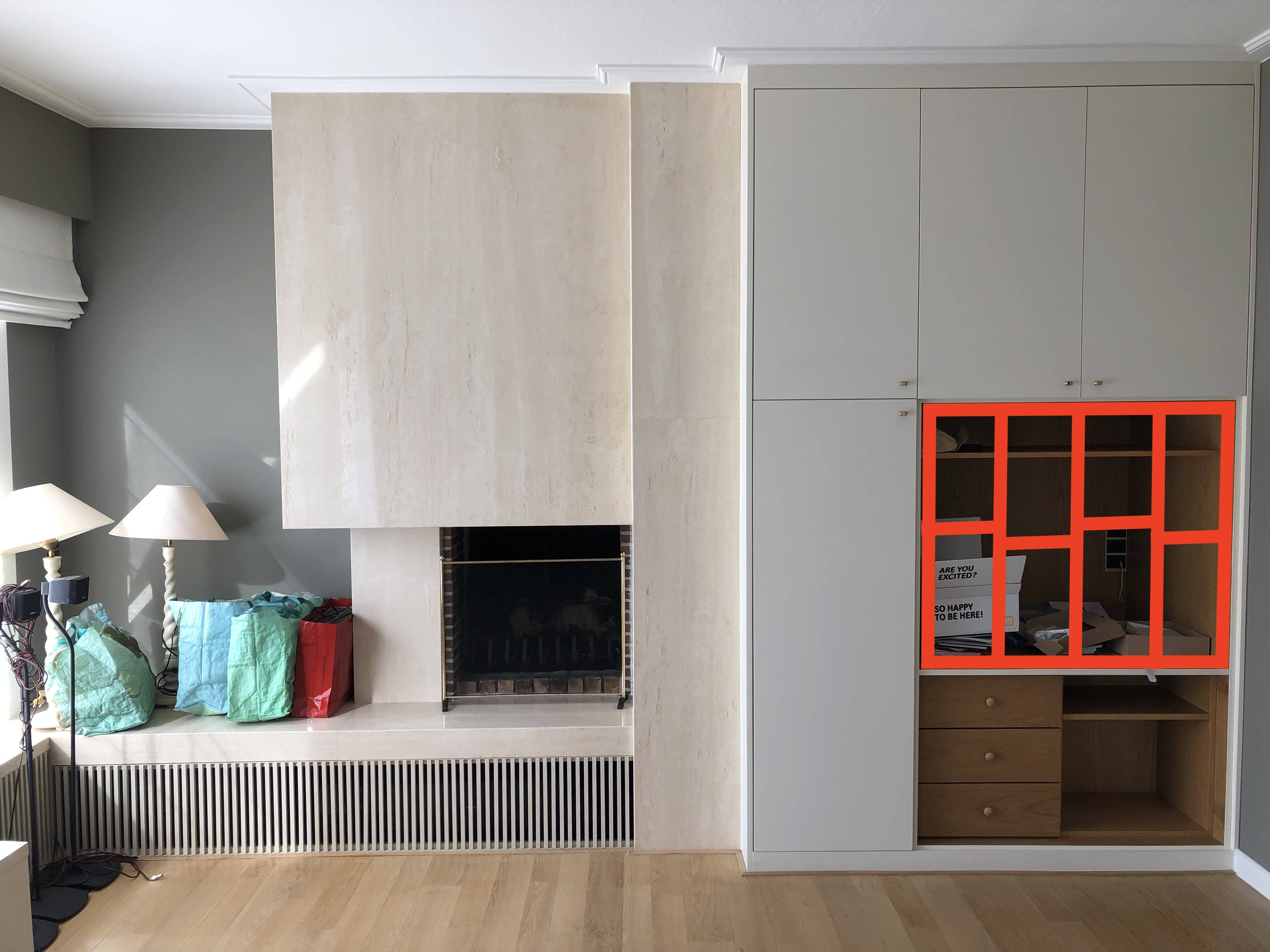 walls creating a frame in an old tv closet to hang a tv too big for