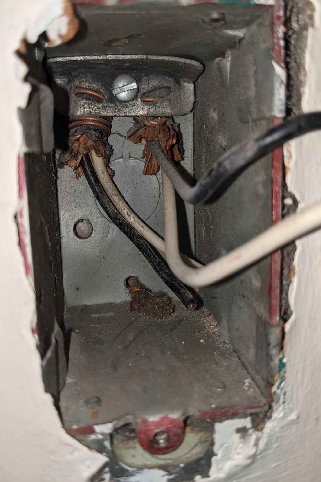 electrical What type of old cable is fed into this outlet, and what