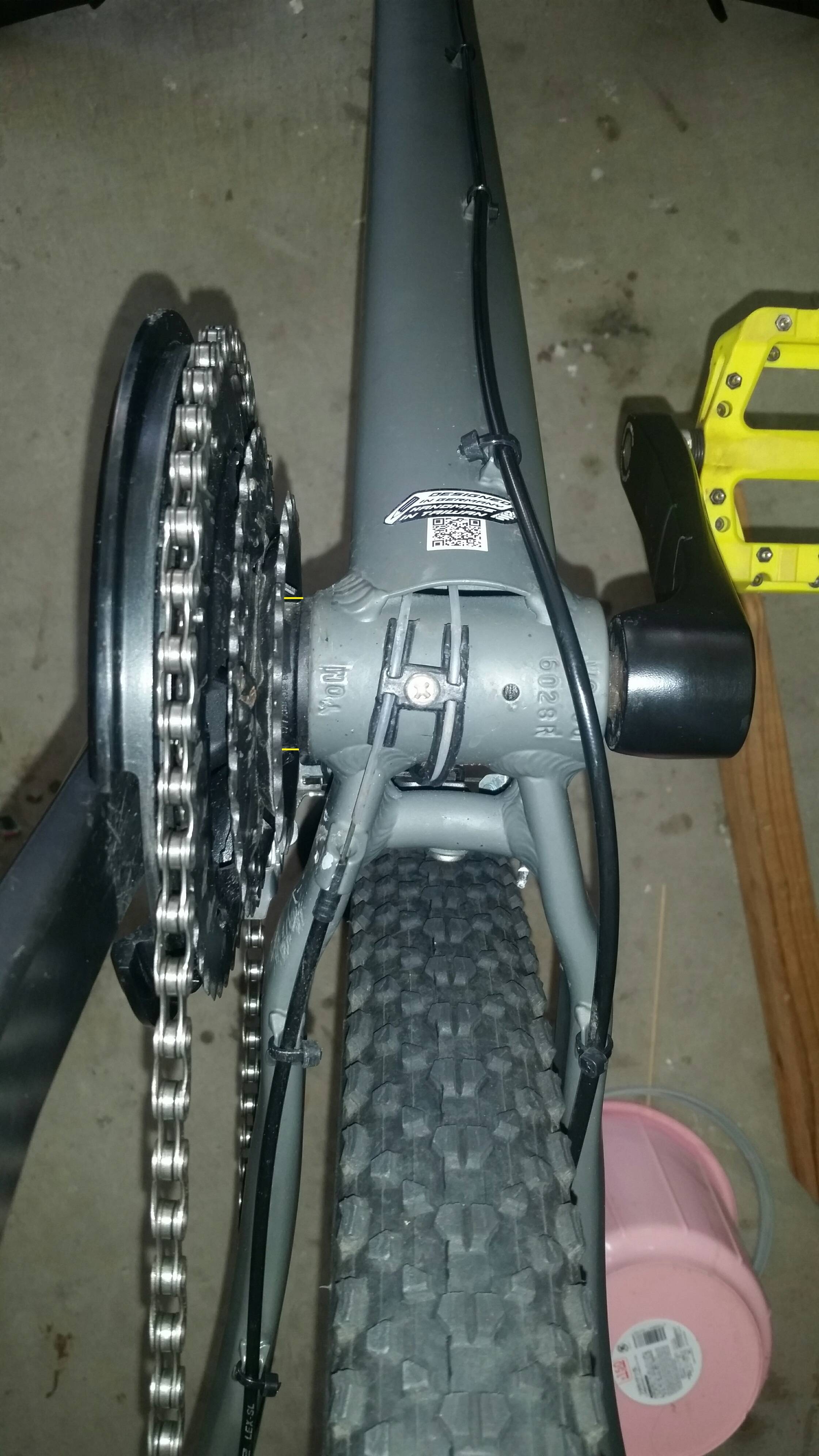 [SOLVED] Chain hitting front derailleur cage with H limit screw fully