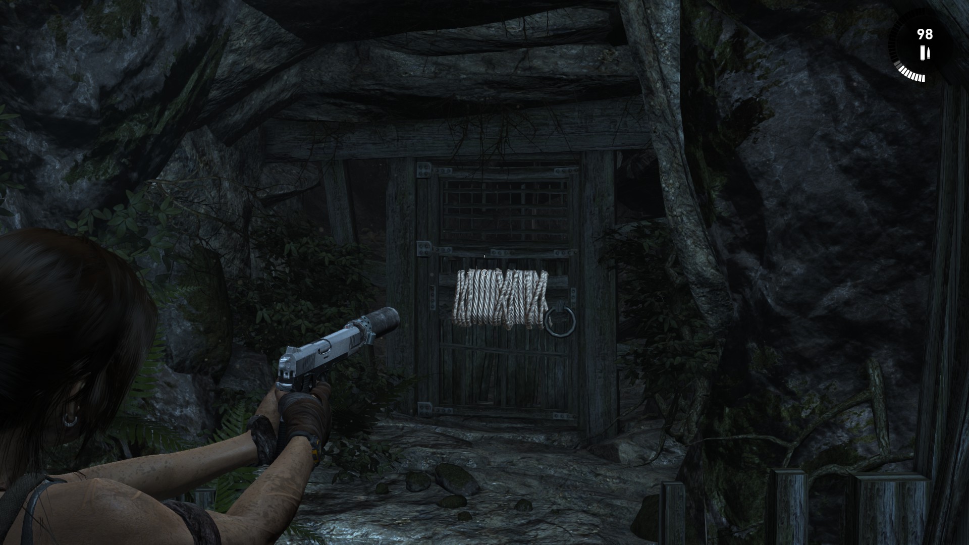 tomb raider 2013 How do you break the rope that is around the door