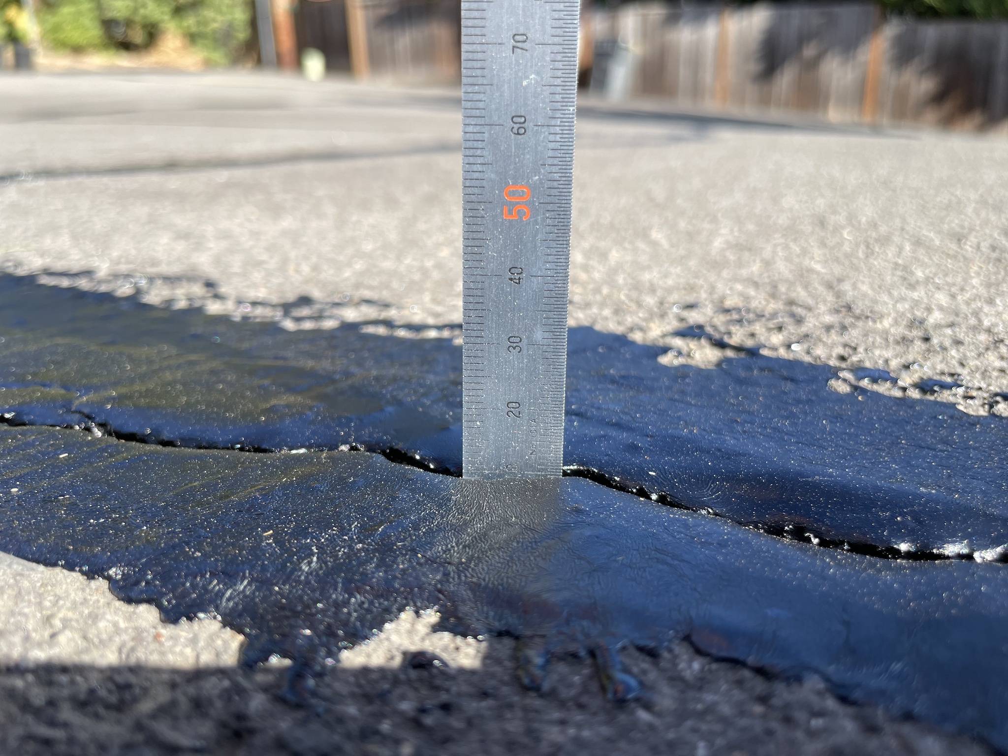 Should asphalt crack sealant fill the cracks to completely level Love & Improve Life