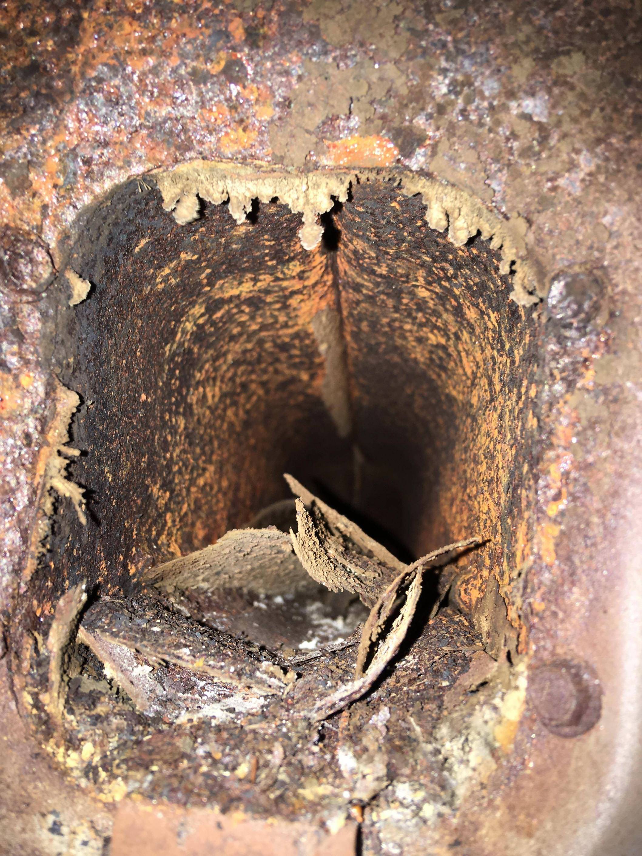 hvac Rust and ash in my AC/furnace should I be concerned? Home