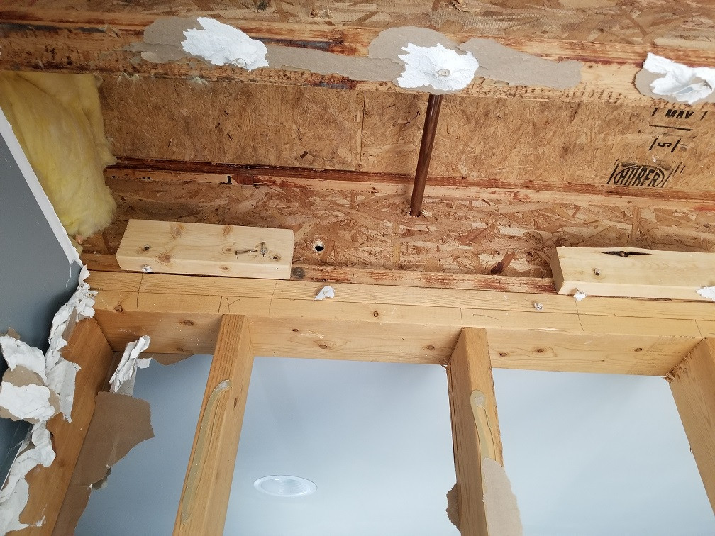 structural Trying to determine if a wall in my basement is load