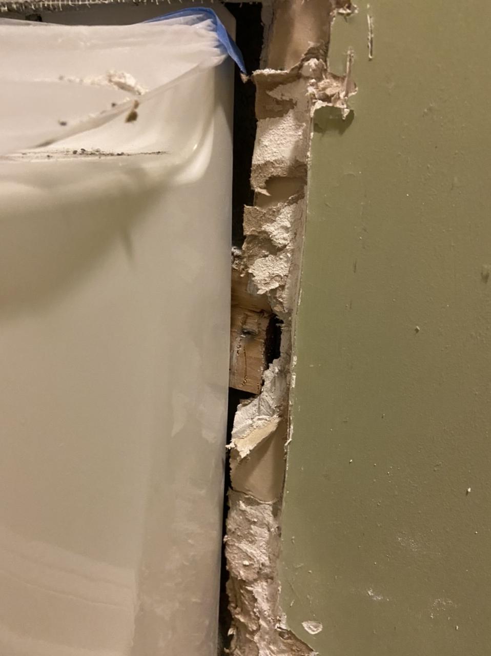 bathroom Drywall or cement board in gap between bathtub and corner