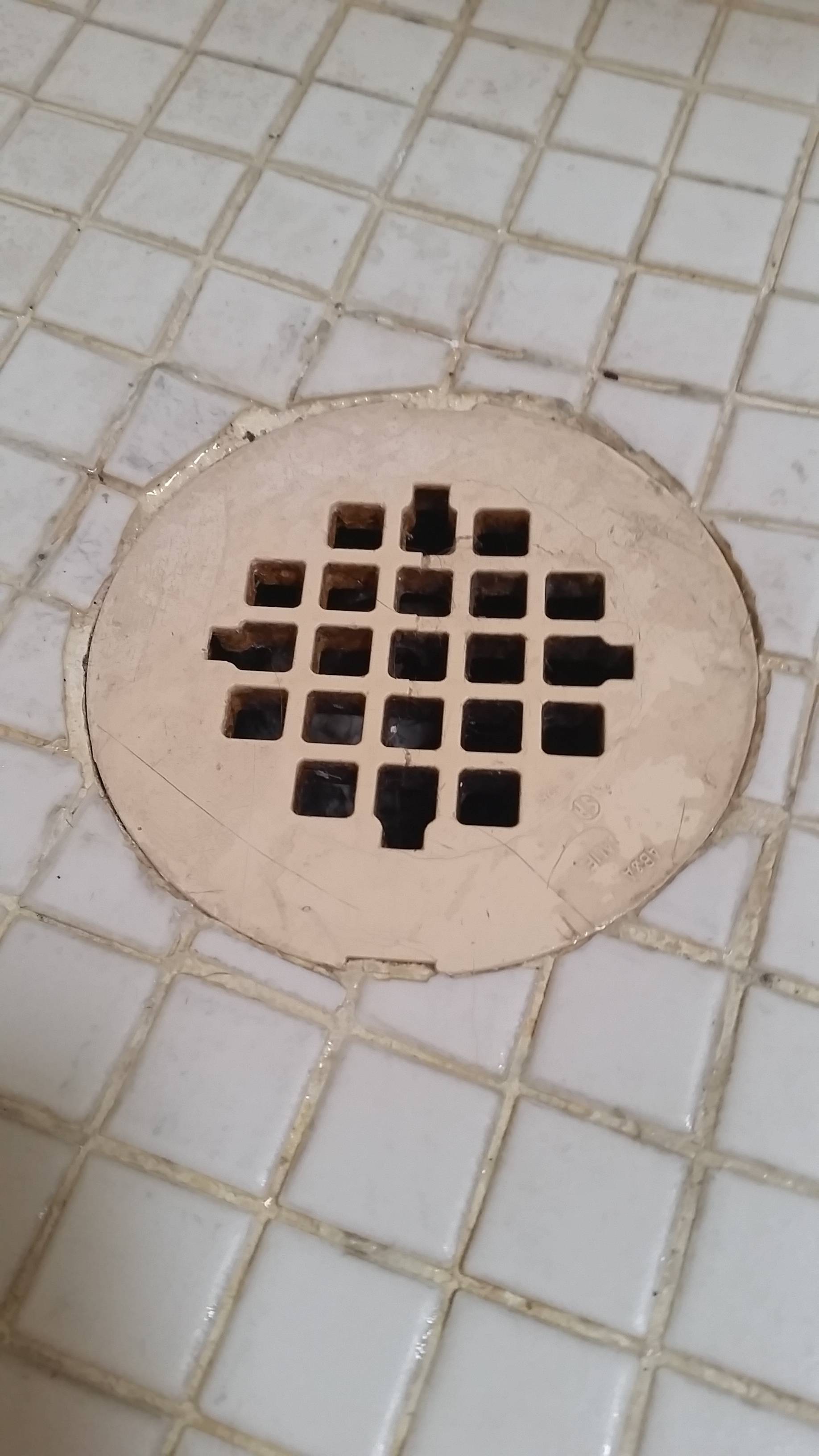 How do I remove this plastic shower drain cover? Home Improvement