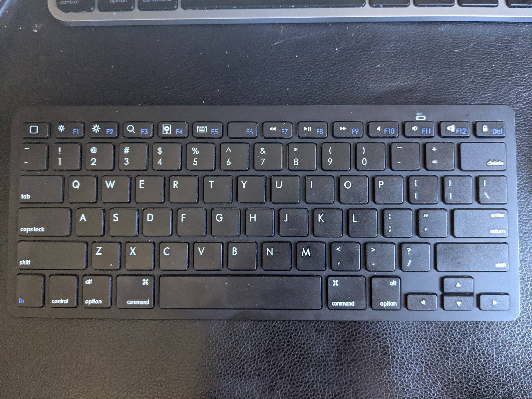 macbook pro What is this bluetooth keyboard and how can I make its Escape and Fkeys work