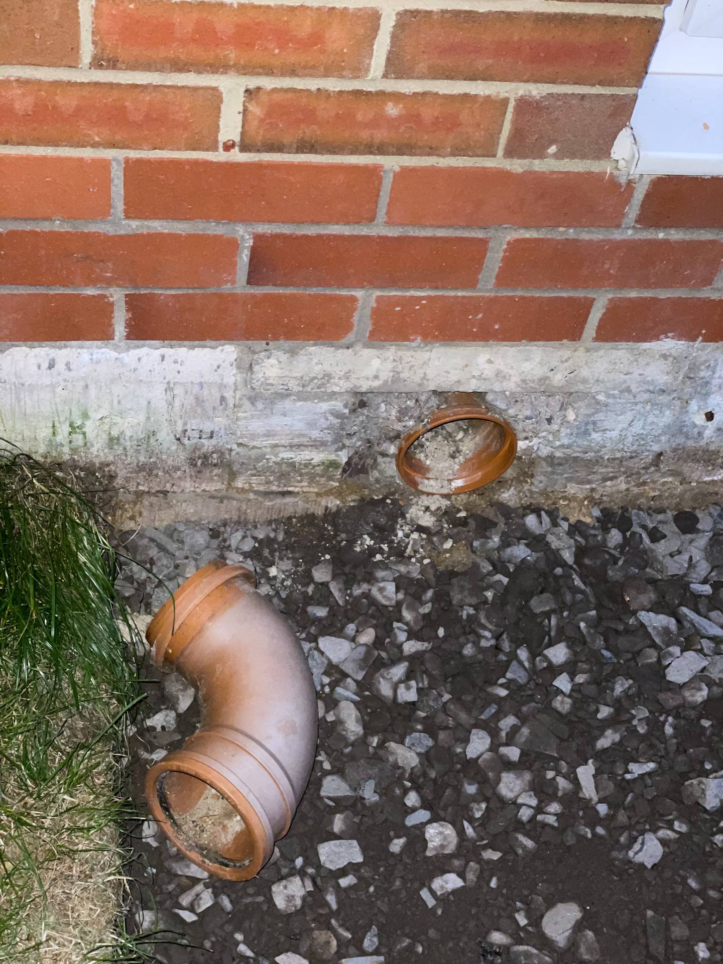 plumbing Help identifying a plastic pipe at the base of the house