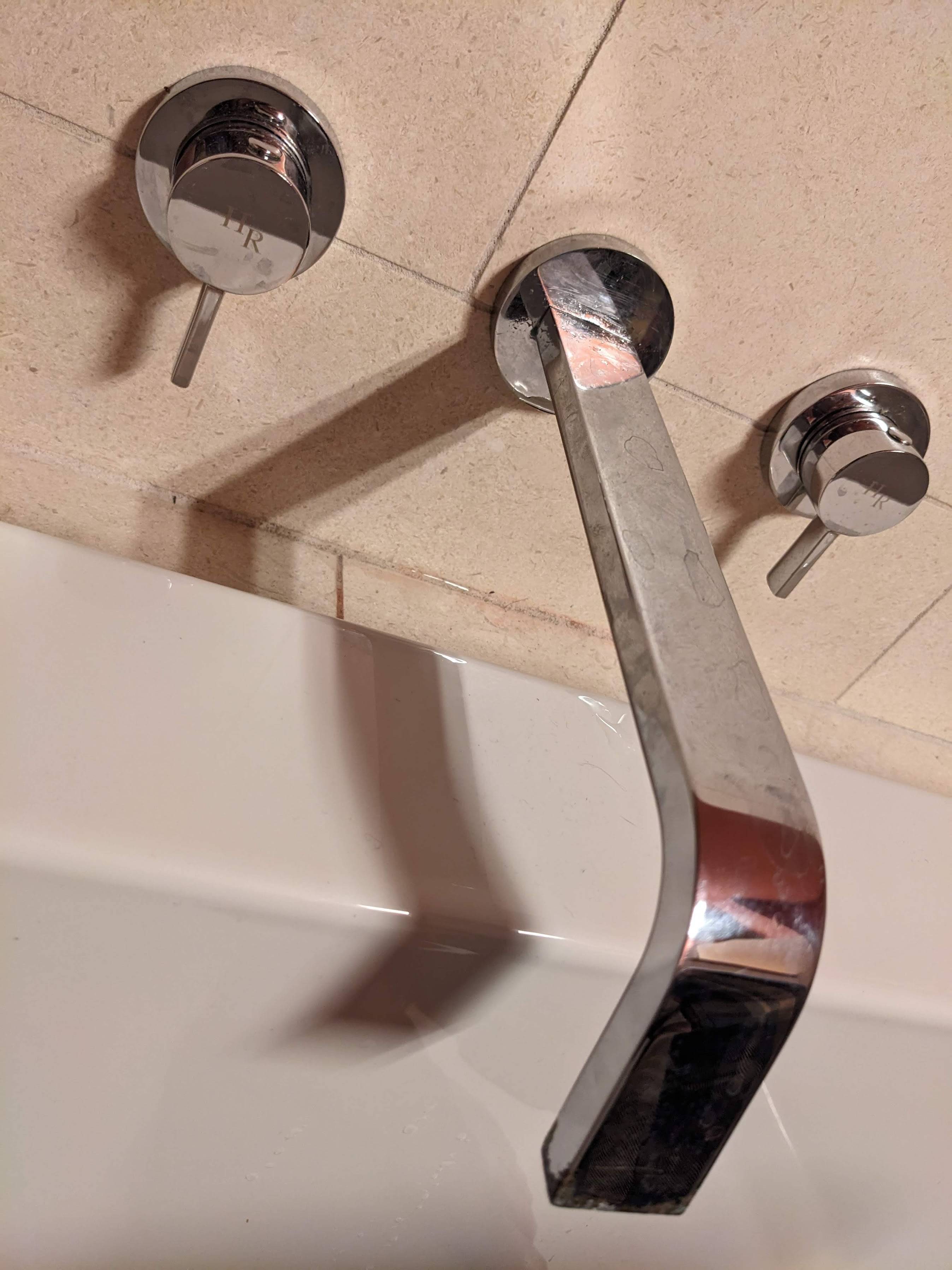 removal - How do I remove this bath faucet? - Home Improvement Stack