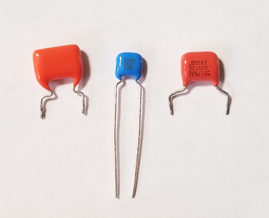 How to visually distinguish metal film and ceramic capacitors (leaded)? Electrical Engineering