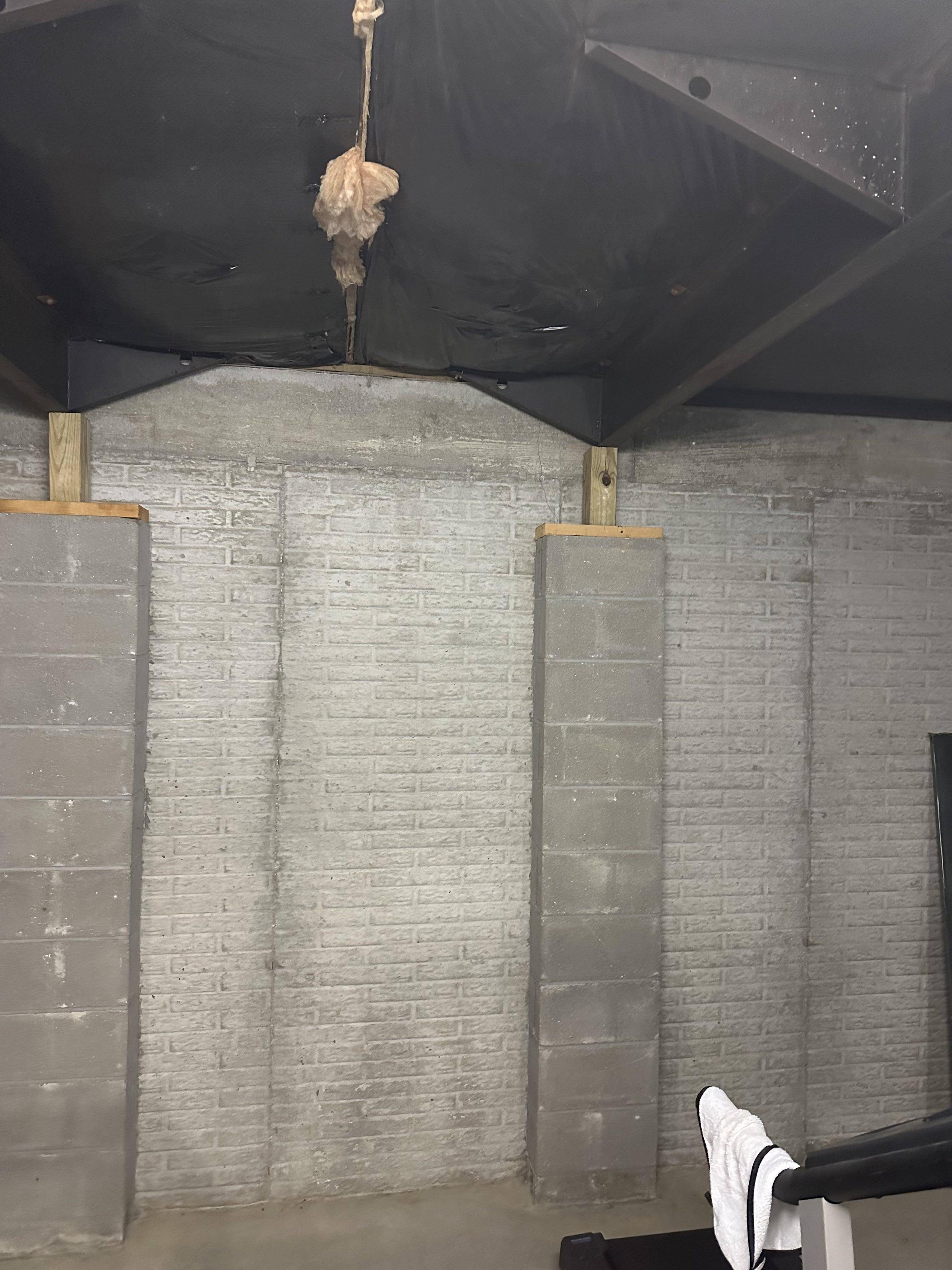 How should I attach basement walls to the foundation when there are no
