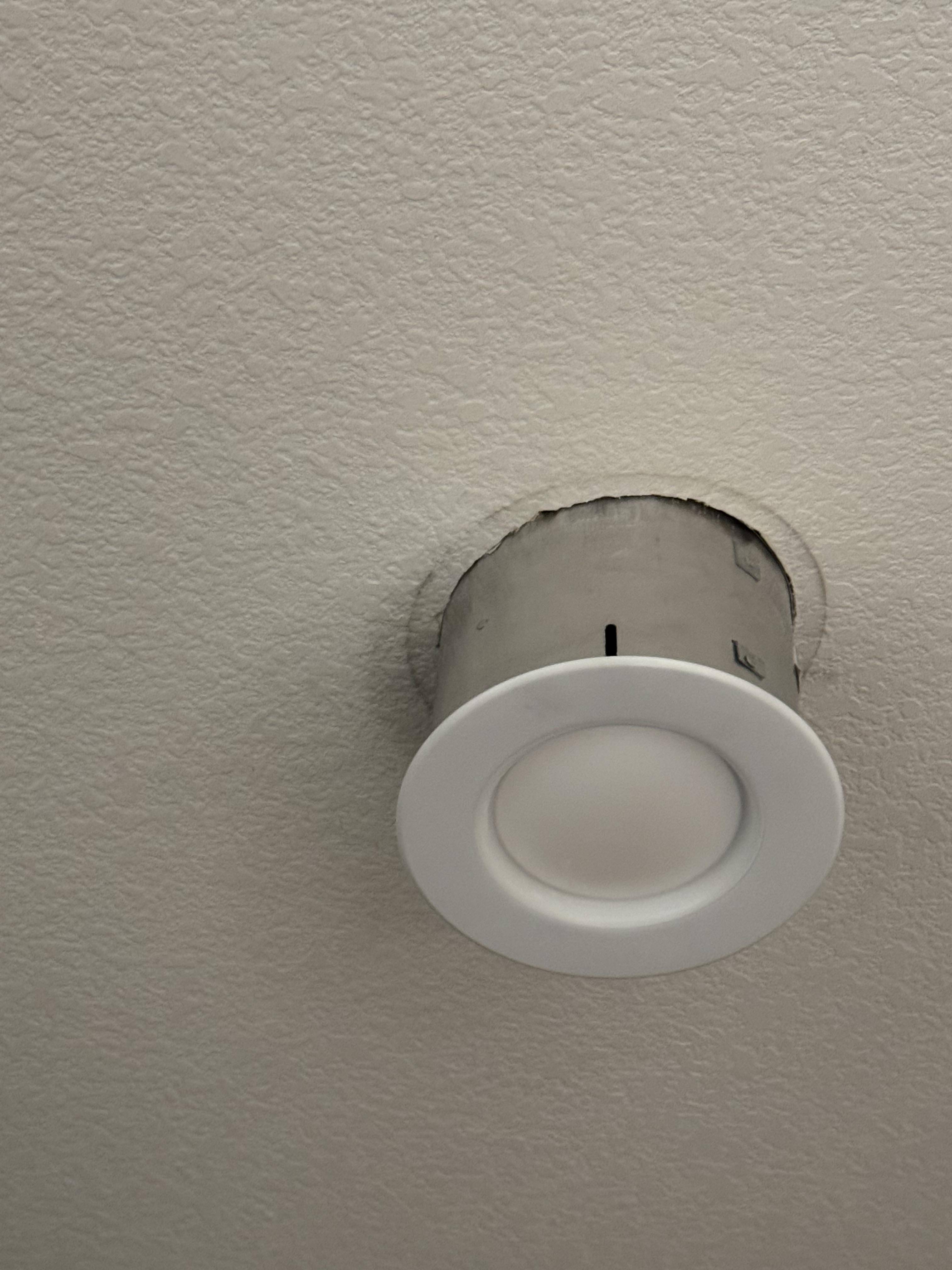 recessed lighting - How can push my can light back up into the ceiling