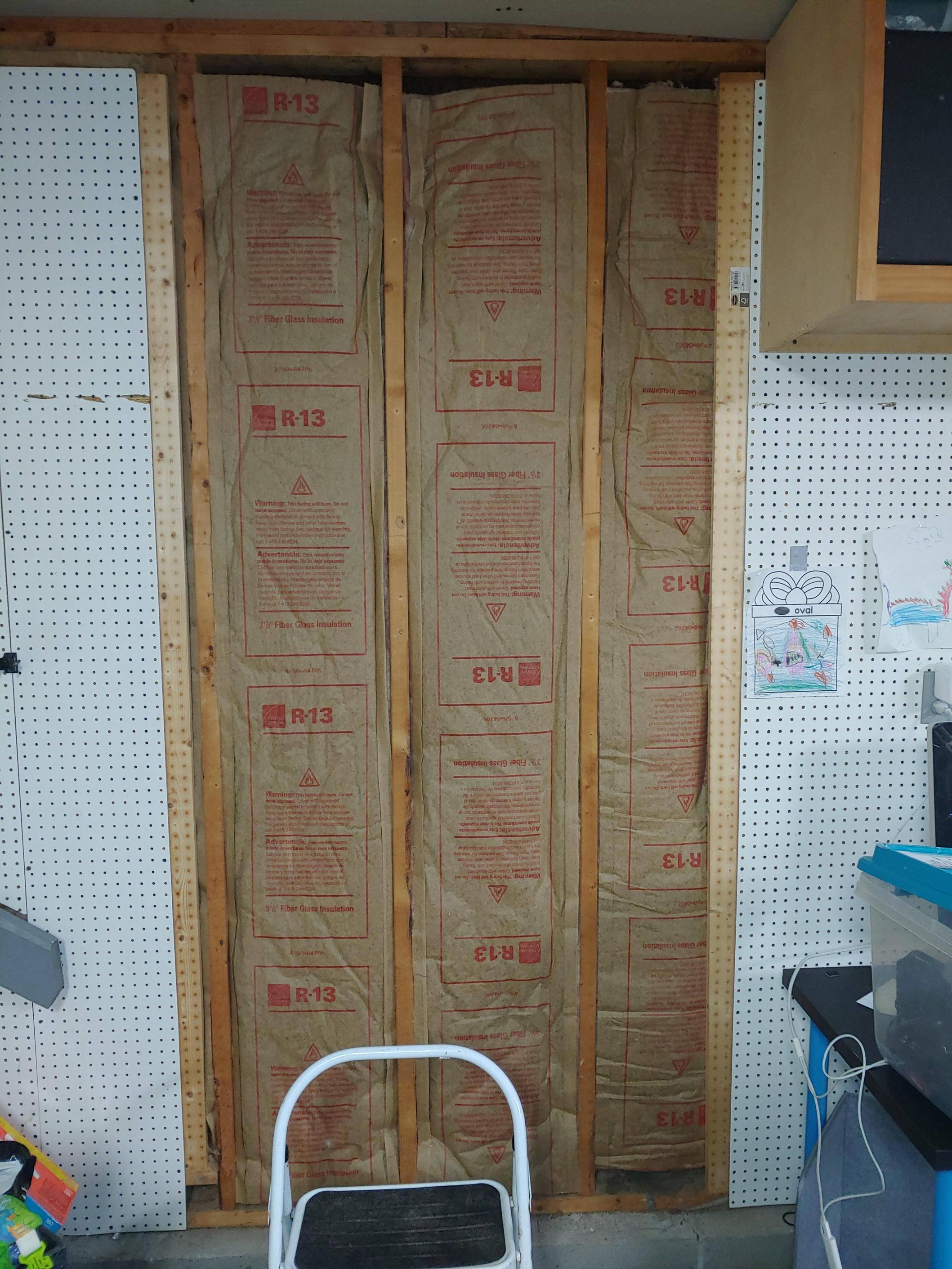 Should I install a vapor barrier before adding drywall to my garage