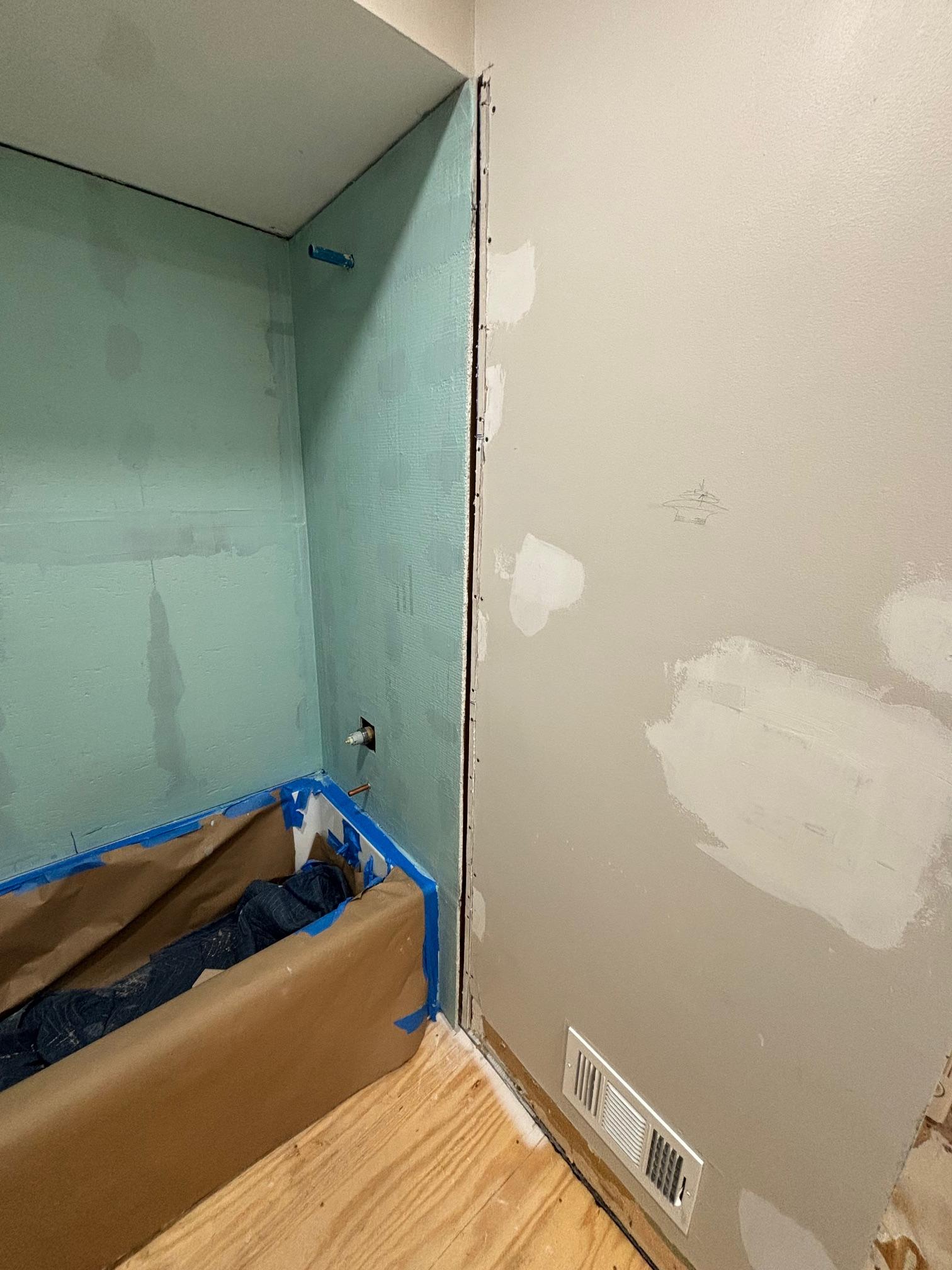 cement board Had to shim out my tub surround walls. How to transition