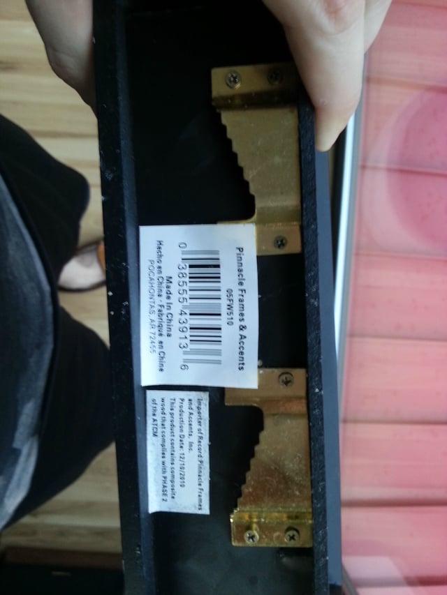 mounting How do I hang a wall accessory fitted with 'Wall Grabbers