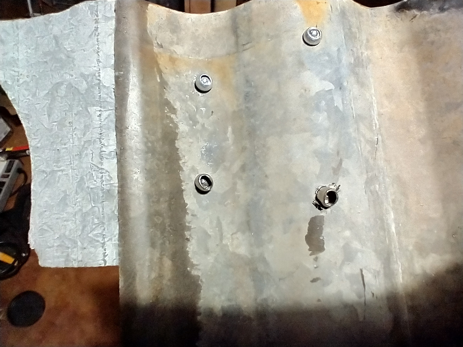 waterproofing Use Rivets for old corrugated Metal Roof Home