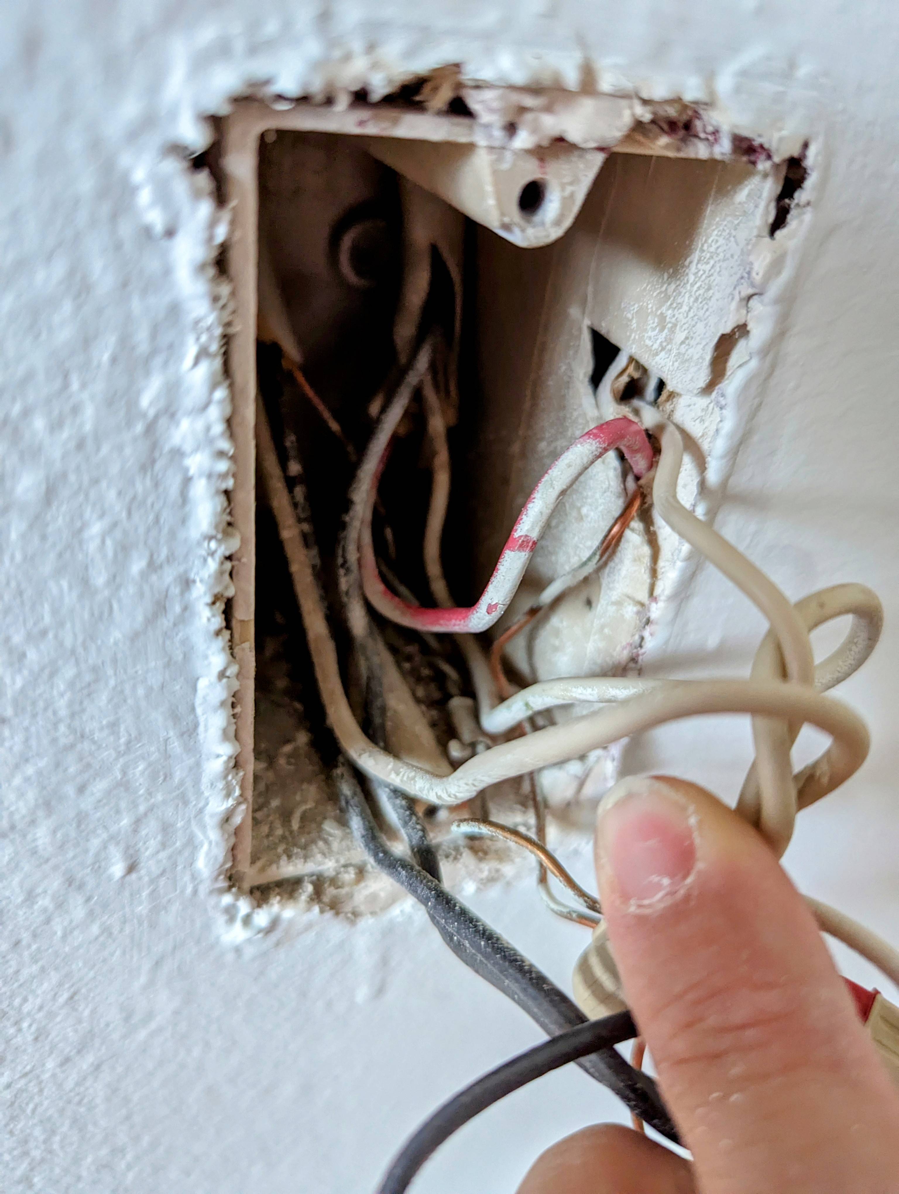 electrical Why would a switched outlet wire be wired through a