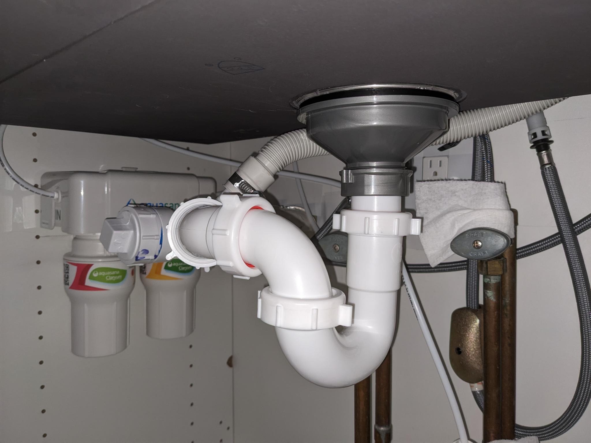 Beginner plumbing kitchen sink, high waste pipe, can I use reversible p