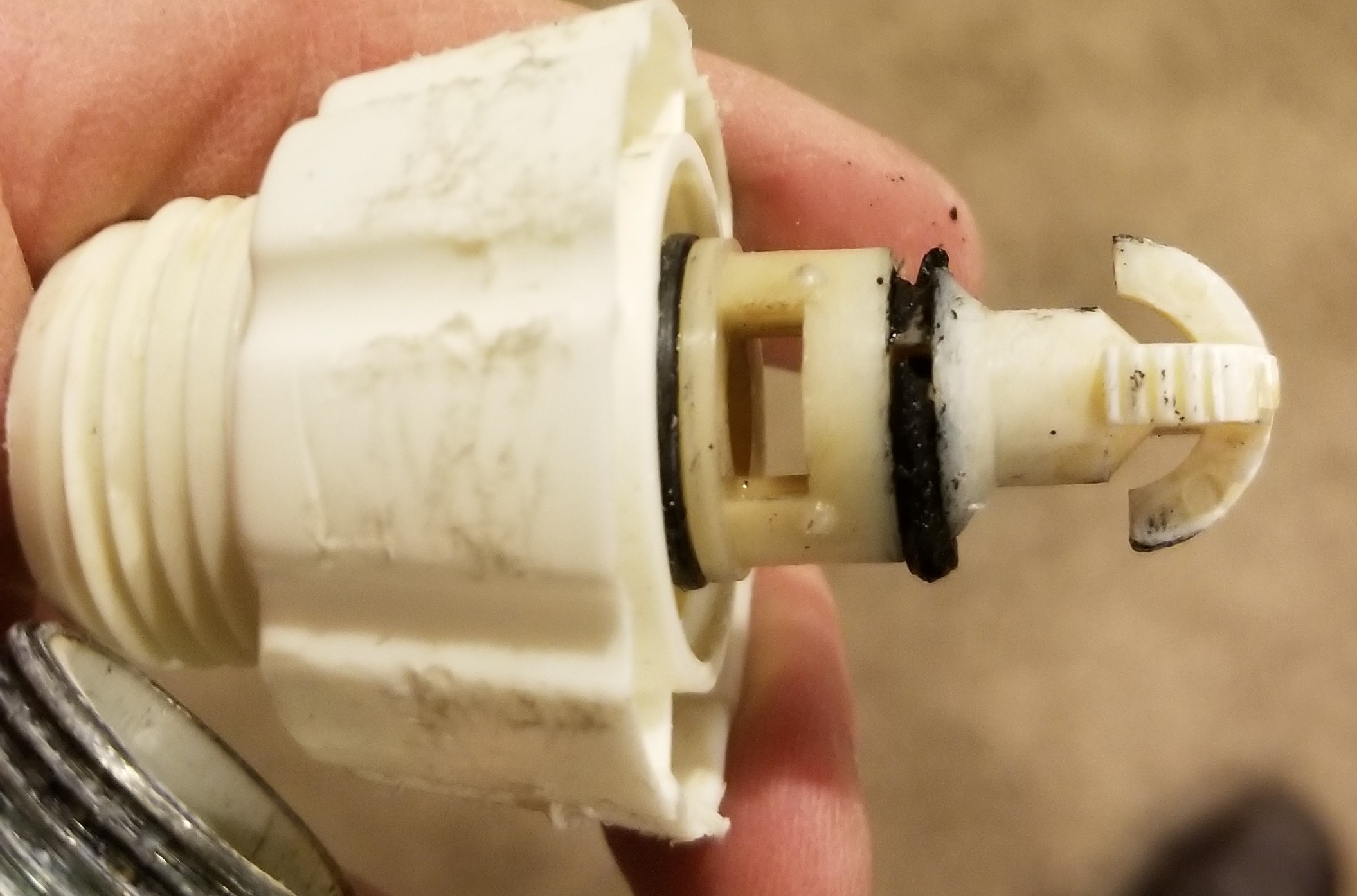 Hot Water Heater leaks through drainage spigot after flushing Home