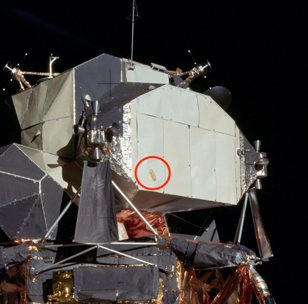 What is this beige, pill shaped object on the back of the Apollo Lunar