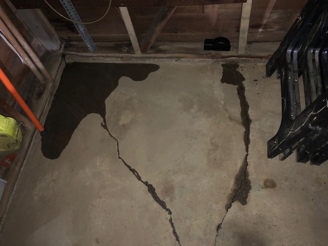Water coming through detached garage concrete floor Home Improvement