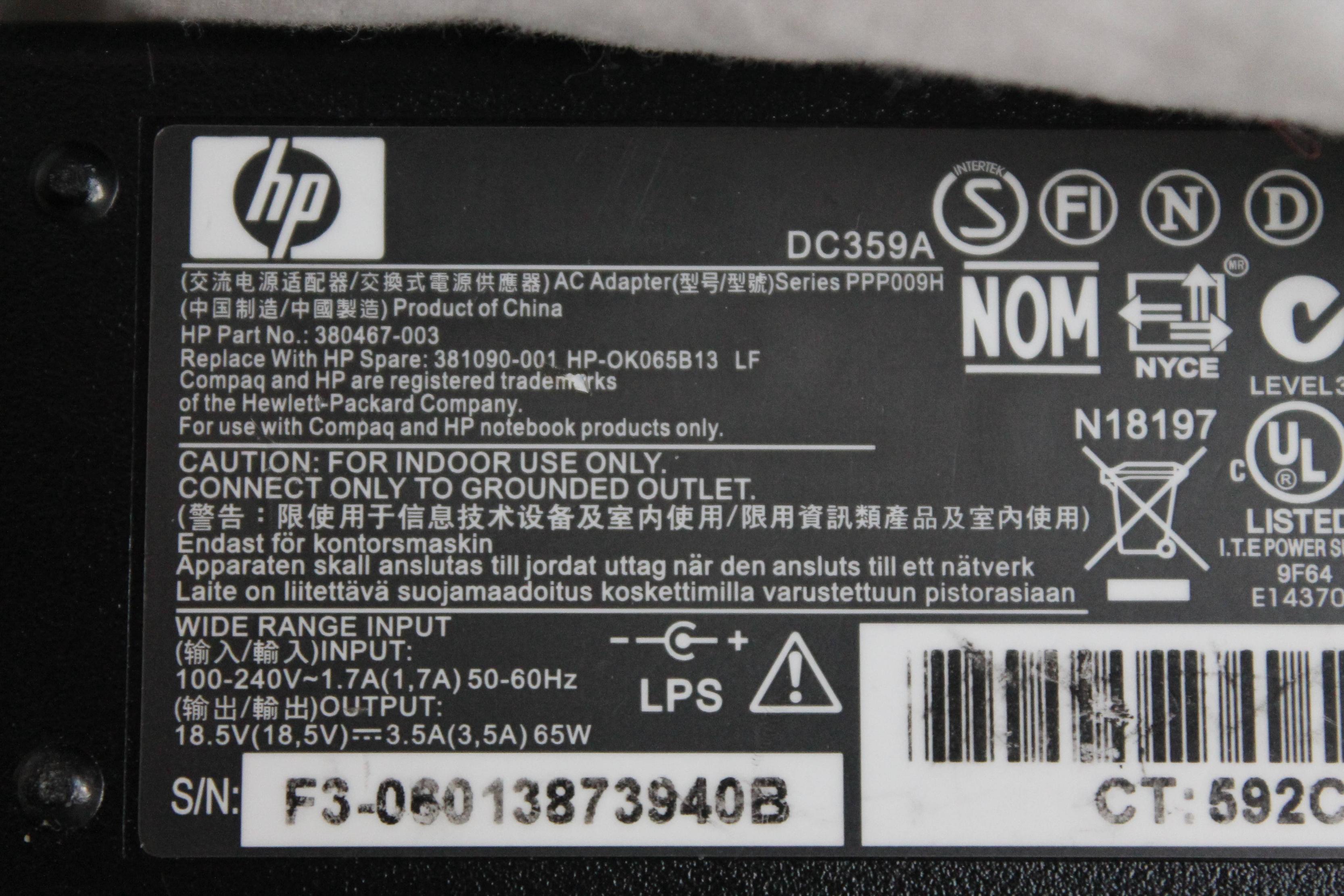 Can a laptop power adapter bought with a UK power cord be used with a