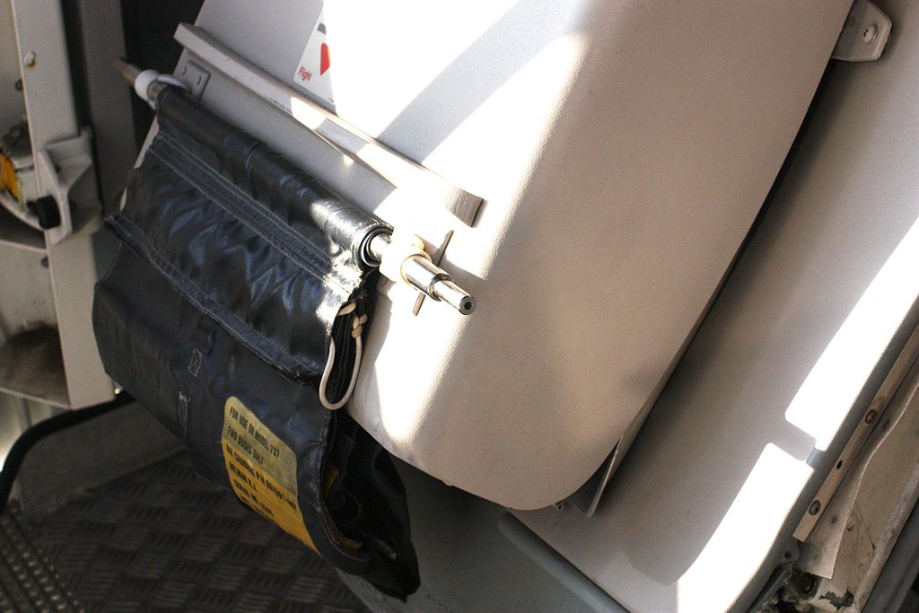 aircraft design Can an armed door be opened from outside an airliner