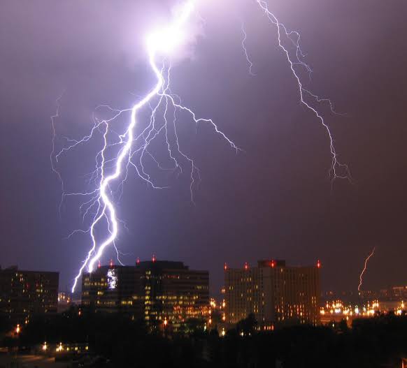 electricity What causes the color difference of lightning flashes
