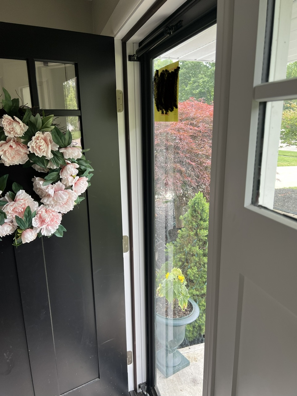 What's the best way to secure a flexing storm door jamb? Home Improvement Stack Exchange