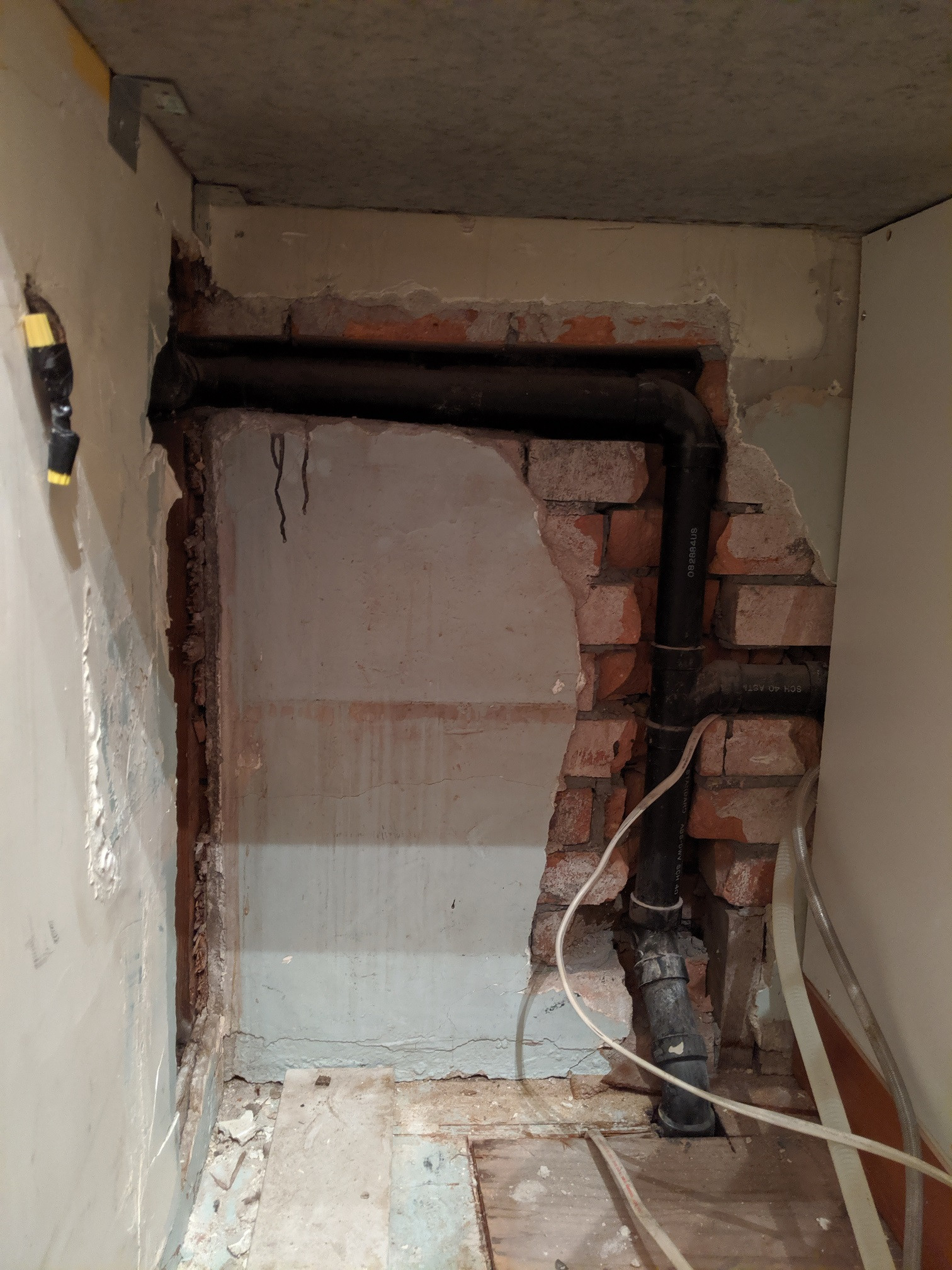 insulation Insulating or air sealing around pipes in brick Home