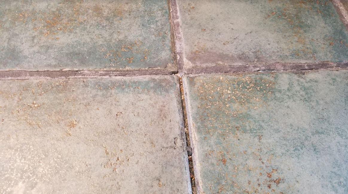 flooring Sanded Grout in Stone Tile Floor Keeps Disintegrating Home Improvement Stack Exchange